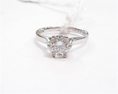 Lot 279 - An 18 carat white gold diamond solitaire ring, the round brilliant cut diamond in a six claw...