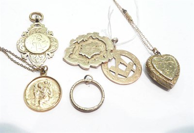 Lot 299 - Two shield fobs, a Masonic pendant, a St Christopher pendant, chains, etc