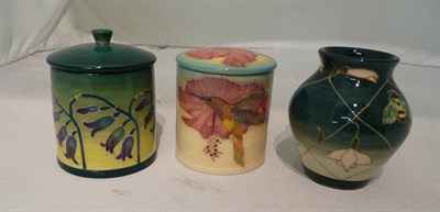 Lot 324 - Two Dennis China Works jars and covers and a vase