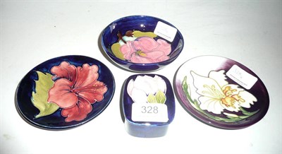 Lot 328 - A Moorcroft magnolia small bowl and a box and cover and two other Moorcroft small dishes