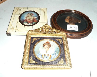 Lot 332 - A portrait miniature of a princess in a decorative gilt metal frame, a wax portrait and a piano key