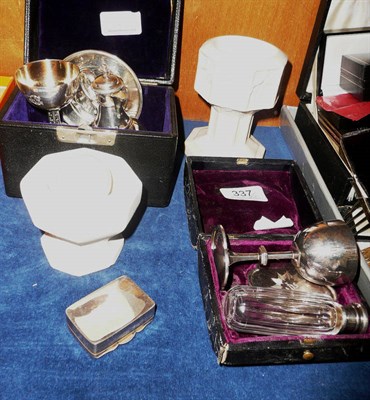 Lot 337 - A silver communion set, a plated communion set and two baptism fonts and a silver snuff box