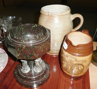 Lot 370 - Two jugs and a marble font