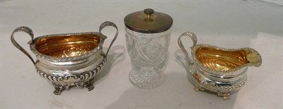 Lot 391 - Silver sugar and cream and a cut glass conserve jar