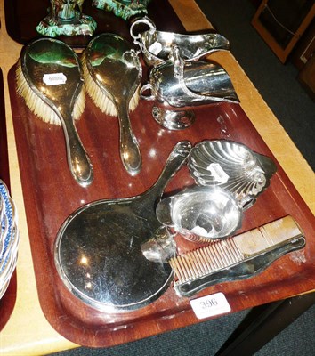 Lot 396 - Silver-backed dressing table set, silver sauce boat, silver shell butter and two pieces of...