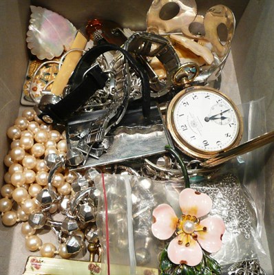 Lot 398 - A box of jewellery including silver locket on chain, brooches, bangles, dress watches etc