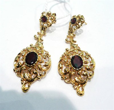 Lot 412 - A pair of 9 carat gold garnet-set earrings