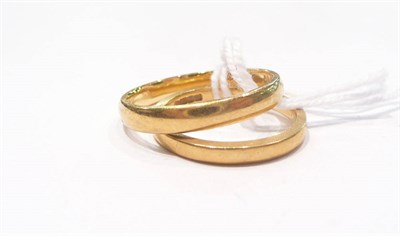 Lot 434 - Two 22 carat gold band rings