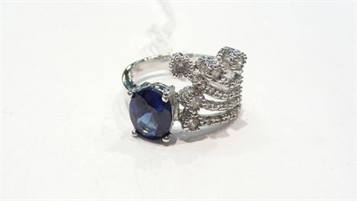 Lot 441 - A sapphire and diamond dress ring