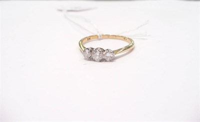 Lot 447 - A diamond three stone ring