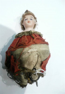 Lot 467 - A bisque shoulder head jester marotte with piercing blue eyes, painted face, original wig,...