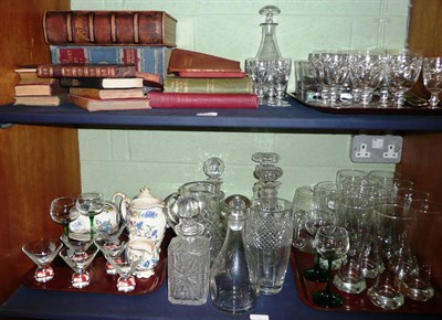 Lot 477 - Glassware, Masons tea wares, books, plated and silver flatware on two shelves