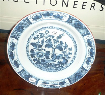 Lot 492 - A tin glaze blue and white shallow dish (a.f.)