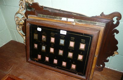 Lot 514 - Mahogany fret cut mirror, a gilt mirror and a butlers pantry bell board