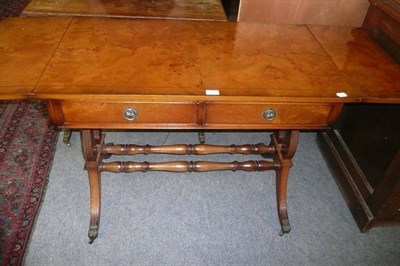 Lot 529 - Yew wood reproduction sofa table