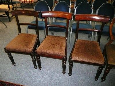 Lot 580 - Three 19th century mahogany dining chairs