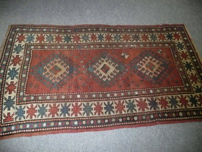 Lot 582 - Kazak rug, Central Caucasus, the madder field with lakh hook medallions