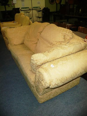 Lot 592 - Two Bridgecraft settees upholstered in gold and a footstool