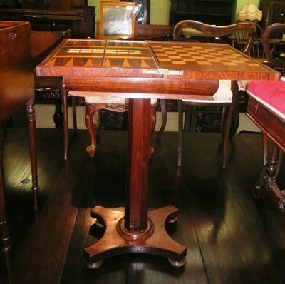 Lot 598 - 19th century rosewood fold over games table