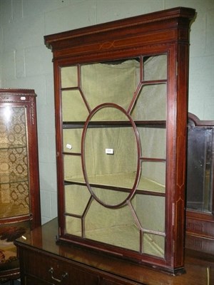 Lot 620 - Edwardian glazed mahogany hanging corner cupboard