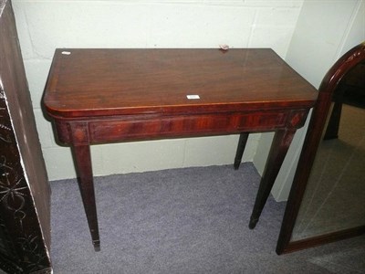 Lot 625 - A George III mahogany and satinwood banded card table