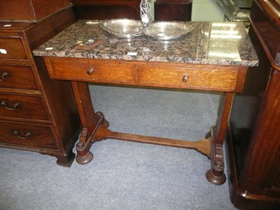 Lot 633 - Oak table with granite top