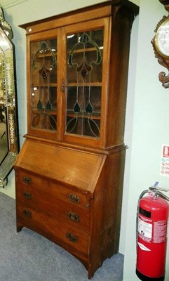 Lot 640 - Oak bureau bookcase and a small display cabinet