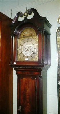 Lot 641 - A mahogany eight day longcase clock, swan neck pediment with carved wooden petals, turned...