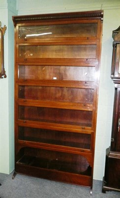 Lot 642 - Mahogany Globe Weinick style bookcase