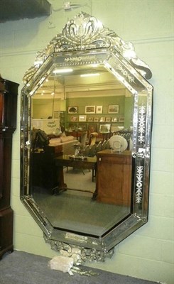 Lot 1001 - A large Venetian style wall mirror