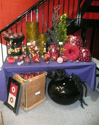 Lot 1009 - Decorations including, Glass vases, resin slave bowls, large black vase, red berry wreaths,...