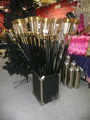 Lot 1013 - Decorations including, Twenty one brass and glass lanterns on poles