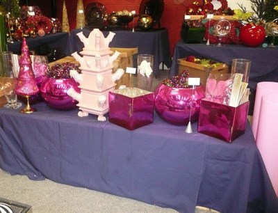 Lot 1021 - Decorations including, Two tall pink glass vases, pink tulip vase, three pink cube vases,...