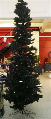 Lot 1026 - Decorations including, Two large black Christmas trees