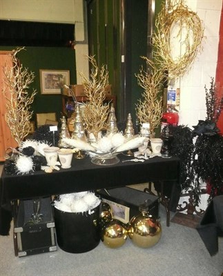 Lot 1039 - Decorations including, Three small gold trees, gold wreath, large lyre vase, silver glass...