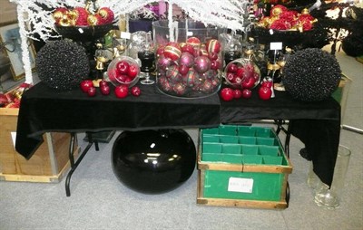 Lot 1047 - Decorations including, large glass vase, two resin slave dishes, candle holders, black urn,...