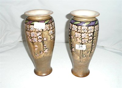 Lot 24 - A pair of Royal Doulton stoneware vases