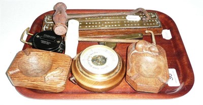 Lot 36 - Mouseman ashtray, brass mounted cribbage board, two boot pulls, pocket compass, small barometer etc