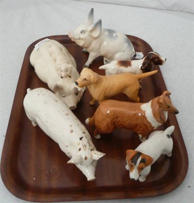 Lot 37 - Three Beswick pig groups and four dogs