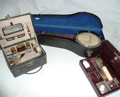 Lot 57 - A banjolele, a vanity box an a shaving box
