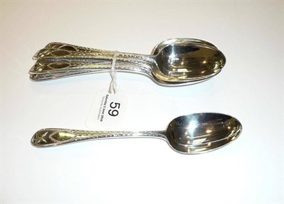 Lot 59 - Set of five silver bright-cut engraved dessert spoons, London 1831 and a matched Irish dessert...