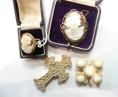 Lot 75 - A cameo ring, brooch, an ivory brooch and a carved ivory cross
