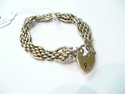 Lot 85 - A fancy gate bracelet with spare link