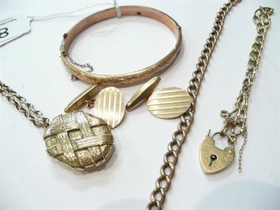 Lot 87 - A 9ct gold bangle, a pair of cuff-links, a locket on a chain, etc