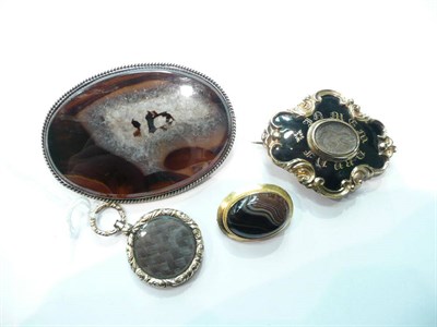 Lot 96 - Two mourning lockets and two agate brooches