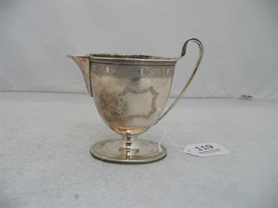 Lot 119 - A late Georgian silver cream jug