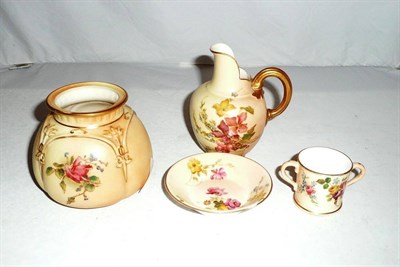 Lot 121 - Four pieces of blush ivory Worcester - a vase, a jug, miniature saucer and miniature two handle mug