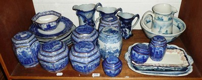 Lot 125 - A shelf of blue and white including Rington's tea caddies, plates, jugs, plated tea service and...