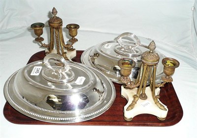 Lot 145 - Pair of silver plated entree dishes and a pair of twin branch gilt metal candelabra