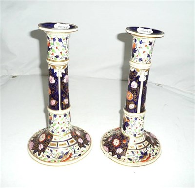 Lot 149 - Pair of 19th century Derby table candlesticks (one af)